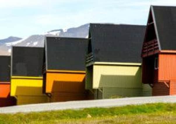 Norwegian houses in Longyearbyen, Svalbard. Picture: PA Photo/Renato Granieri.