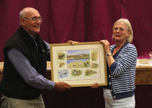Local wildlife artist Ernest Leahy donated one of his watercolours to the Hemel Hempstead RSPB. PNL-140820-145526001