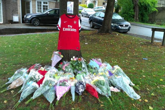 Rest in peace: Tributes left to Fazan Ahmed, pictured below