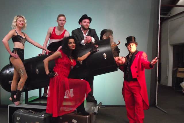 Law graduate Gary Stocker, centre, walked away from a six-figure salary to start up Chaplin's Circus PNL-140821-171253001