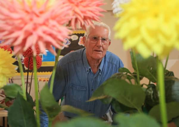 Flower judge Keith Fleckney at the Bovingdon Horticultural Society's Autumn Show