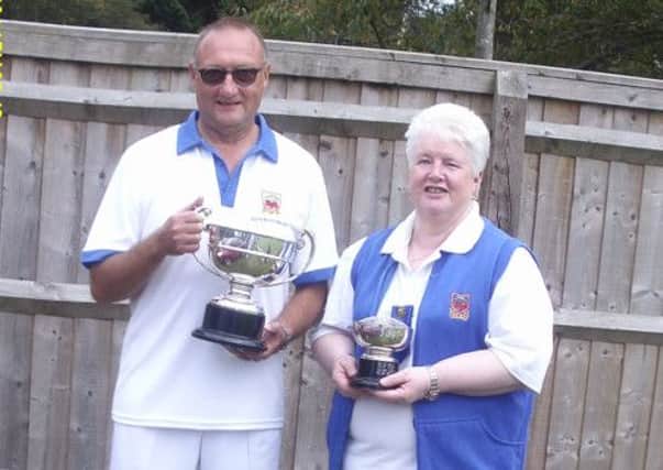 Potten End ladies' and men's Singles Championship winners Keith Martindale and Ann Wigmore