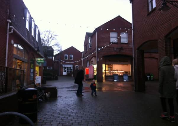 Dolphin Square, Tring, January 2013, and to the left, Marks and Spencer