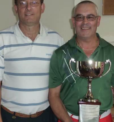 Ivinghoe Golf Club captain Emilio Petrou, left, with Handicap Club Championship winner Paulo Lanca