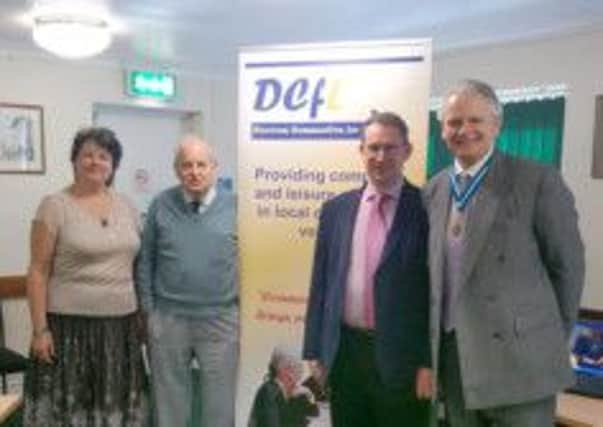 High Sheriff of Hertfordshire Fergus McMullen with, from left to right, Linda Nateghi (DCFL Manager), Geoff Lawrence (DCFL Chairman) and John Parkey (DCFL Secretary)