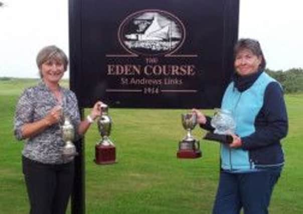 Little Hay's Clare Stammeijer (left) and Linda Reeve holding their trophies after triumphing at the Public Golf Course Championship