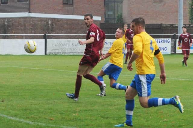 Jamie Gavin, centre, scores Berko's second goal