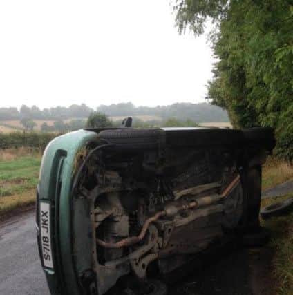Adrian Johnson wants to thank the passers-by who helped him when his car flipped over on Saturday morning PNL-140922-175055001