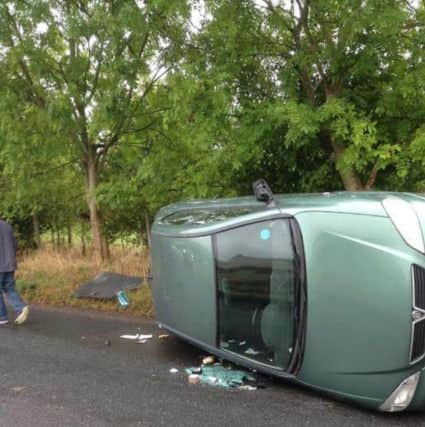 Adrian Johnson wants to thank the passers-by who helped him when his car flipped over on Saturday morning PNL-140922-175117001