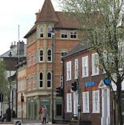 Artist's impression of how Berkhamsted's former police station could look if plans to turn it into flats and a library go ahead PNL-140923-142626001