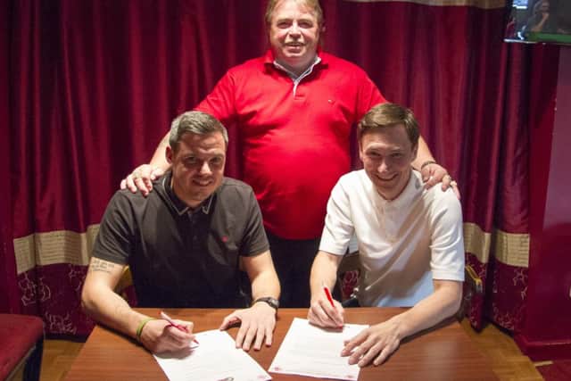 Dean Brennan, left, and Stuart Maynard with Hemel Town FC chairman Dave Boggins. Picture (c) Darren Kelly