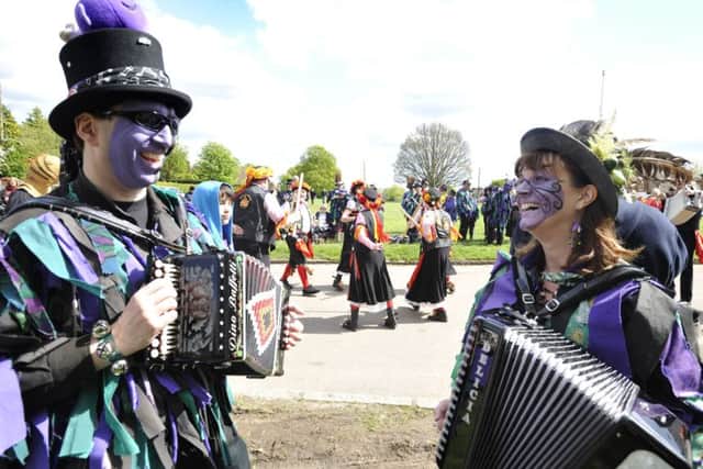 Dacorum Borough Councillor Anthony McKay and Gill Clough of Boxmoor provide music for the Wicket Brood Border Morris
