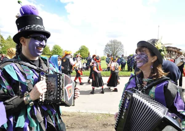 Dacorum Borough Councillor Anthony McKay and Gill Clough of Boxmoor provide music for the Wicket Brood Border Morris