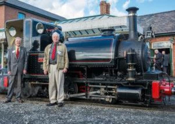 Richard Hope OBE (left) and new president David Mitchell at the Wharf Station Tywyn on the Talyllyn Railway, with Locomotive No 1 Talyllyn.  Photo by Darren Turner