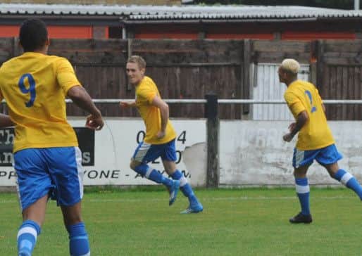 Josh Chamberlain celebrates