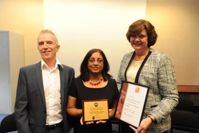 3 star awrards at Dacorum Civic Centre on Thursday.
Director of housing Mark Gaynor, Dharini Chandaran, support housing manager and Councillor Margaret Griffiths PNL-140210-144453009