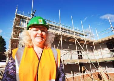 Julia Hedger in front of a new homeless hostel being built in Redbourn Road, Hemel Hempstead