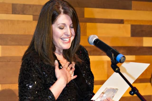 Joanna Miller reading one of her poems.