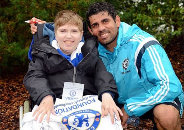 Jamie with Chelsea and Spain superstar Diego Costa and the Instagram feed showing it got over 99,000 'likes' (below)