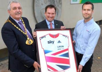 Mayor of Dacorum Allan Lawson and borough councillor Neil Harden presented with a framed GB cycling jersey by Peter Cox British Cycling following the Tour of Britain
