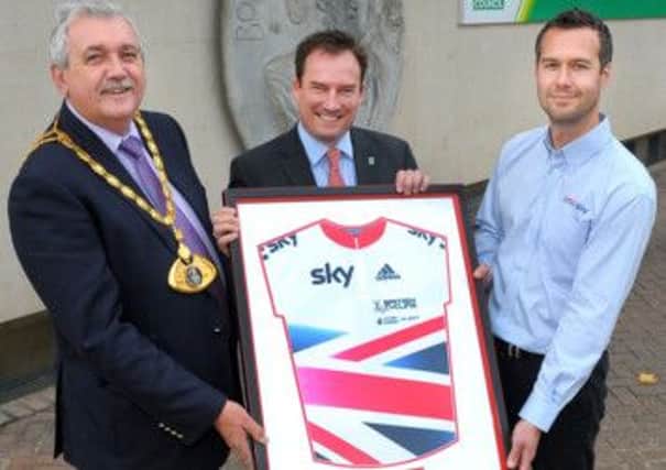 Mayor of Dacorum Allan Lawson and borough councillor Neil Harden presented with a framed GB cycling jersey by Peter Cox British Cycling following the Tour of Britain