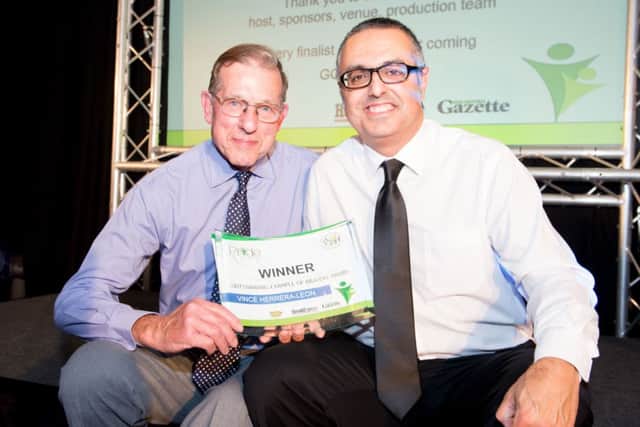 Pride in Dacorum 2014 awards evening at Pendley Manor - pictured is Peter Roberts with Vince Herrera-Leon PNL-141025-210258009