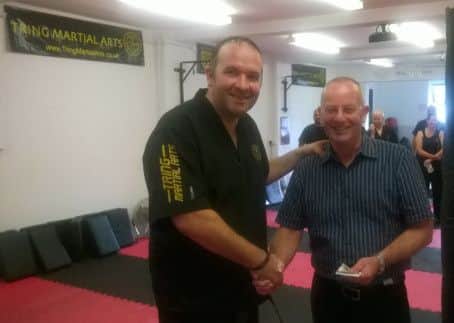 Chris Allen of Tring Martial Arts with Henry Nash's dad Andrew Nash at a memorial sparring session in Henry's memory.