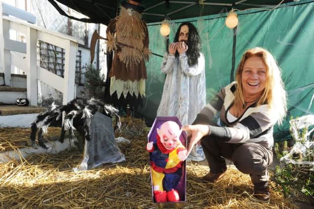 Julea Arthur and her Halloween display in her front garden in Sunnyhill Road, Hemel Hempstead