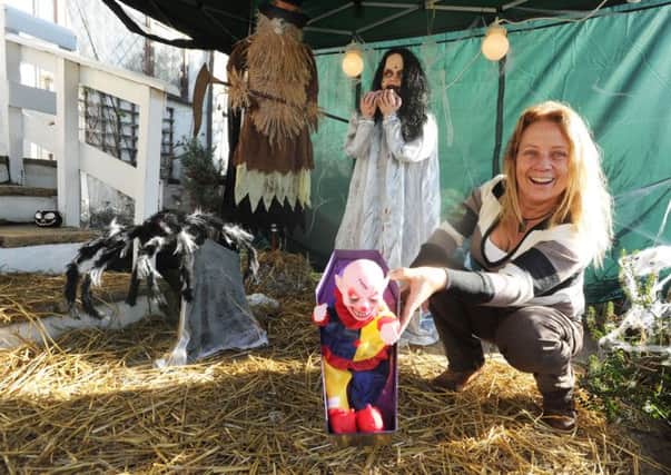 Julea Arthur and her Halloween display in her front garden in Sunnyhill Road, Hemel Hempstead