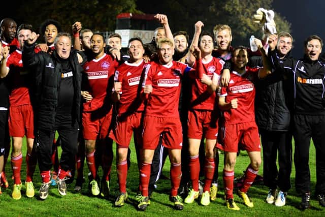 Hemel Town FC players celebrate their FA Cup victory over Nuneaton Town. Picture (c) Cameron Maclean - CM Photography