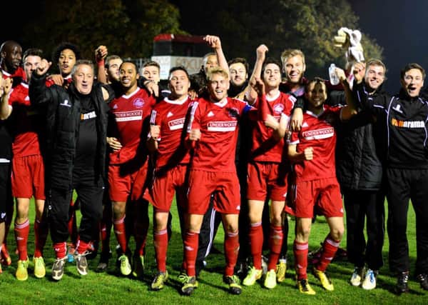 Hemel Town FC players celebrate their FA Cup victory over Nuneaton Town. Picture (c) Cameron Maclean - CM Photography