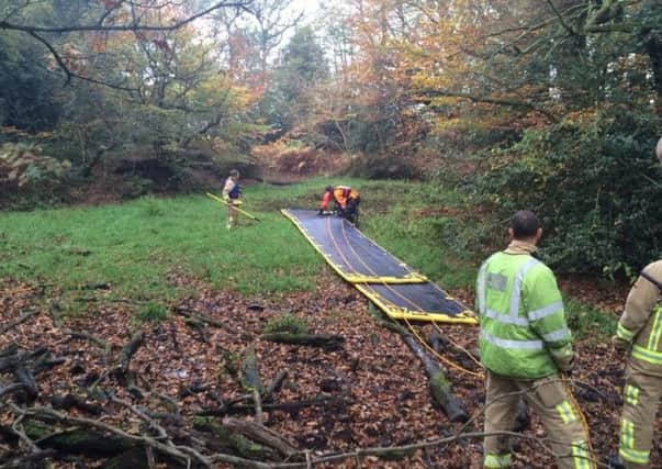 Inflatable path used to rescue man stuck in mud at Norcott Hall