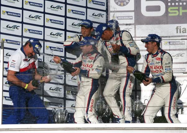 Toyota Hybrid Racing celebrate their victory in Shanghai, China. Picture (c) James Moy Photography