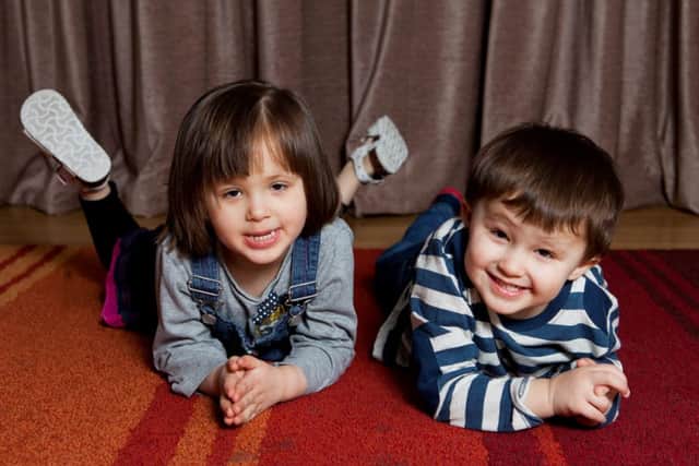 Emma Whittaker, four, and her brother James, three