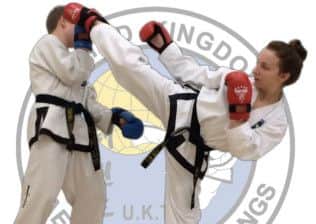 Tae Kwon-Do UK Open 2014 gold medallist Jade Doran demonstrates a technique on her brother Daniel