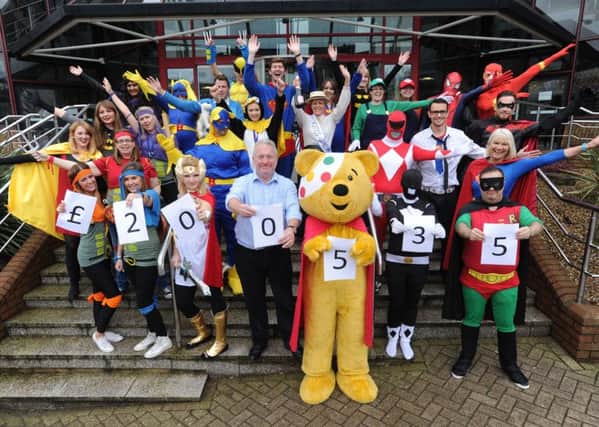 Mike Penning MP, Pudsey Bear and the staff of Haven Holidays, Hemel Hempstead