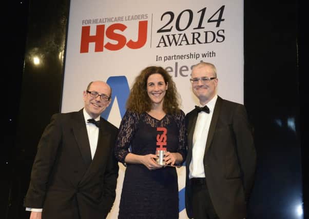 Samantha Jones receives the HSJ Chief Executive of the Year award with journalist Nick Robinson and chief executive of NHS Employers Danny Mortimer