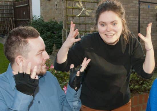 Mia Ward teaches sign language.