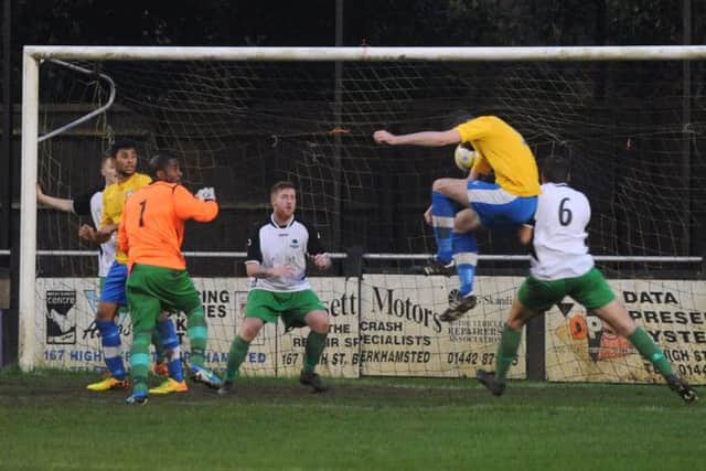 Ed Canham heads home Berkhamsted's third goal