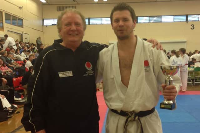Malcolm Phipps congratulates Adam Cockfield on his victory at the Portsmouth Open Karate Championships