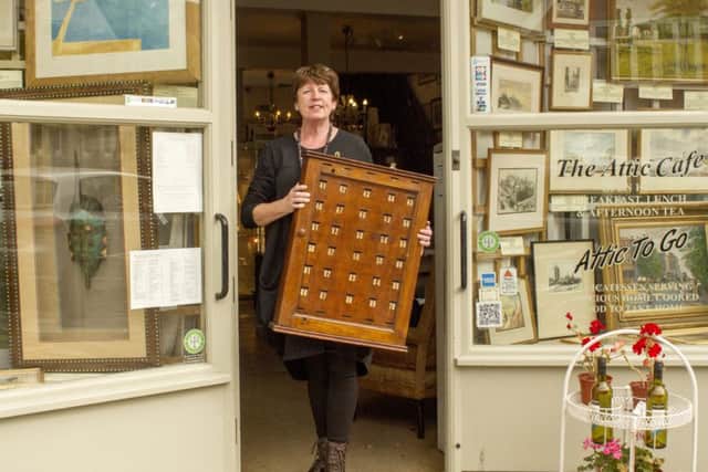 Eileen Foxwell from Home & Colonial in Berkhamsted is featured among 40 small businesses in Sir Peter Blakes new work called High Street Heroes. Photo: American Express PNL-141126-122717001