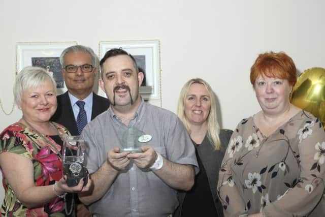 Heart of Gold Award winner. From left, Dawn Sharp (Business Manager), Alnur Dhanani (Chairman), Graham Reid (award winner), Nicola Coveney (Managing Director), Anna Marrah (Home Manager).