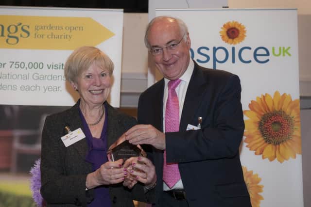 Hospice of St Francis volunteer Kay Lewis is recognised for 21 years of giving back.