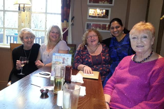 Volunteer Centre team members Barbara Reynolds Sale, Hilary Edmonds, Sara Woodley, Sathya Raman and Janet Husband at their Christmas meal