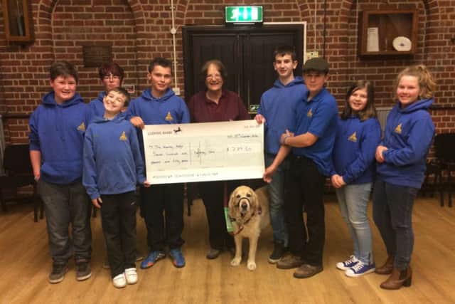 Berkhamsted Junior Young Farmers present a cheque to the Hearing Dogs charity