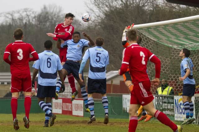 Oliver Hawkins heads home the opening goal against St Albans. Picture (c) Darren Kelly