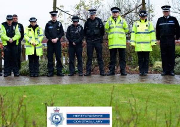 Hertfordshire Police officers observed two minutes silence to pay tribute to those who lost their lives in the shootings in Paris earlier this week