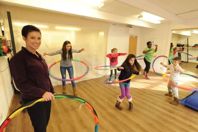 Launch of HealthyU, Bennetts End, Hemel Hempstead.
Samantha Harry,left, runs the power hooping session. PNL-151001-142220009