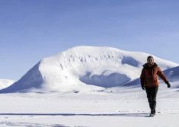 Sarah Marshall hikes in the hills above Lyngsfjord Adventure Camp Tamoc in Norway. Picture: PA Photo/Renato Granieri. PNL-150119-105259004