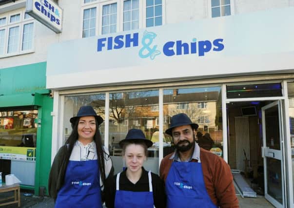 Staff at Fish and Chips at Lawn Lane, Hemel Hempstead .From left Rachael Williamson, Emma Newton and manager Zahir Hussain